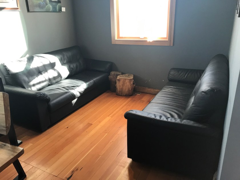 Couches are just near the front door and look extremely comfortable