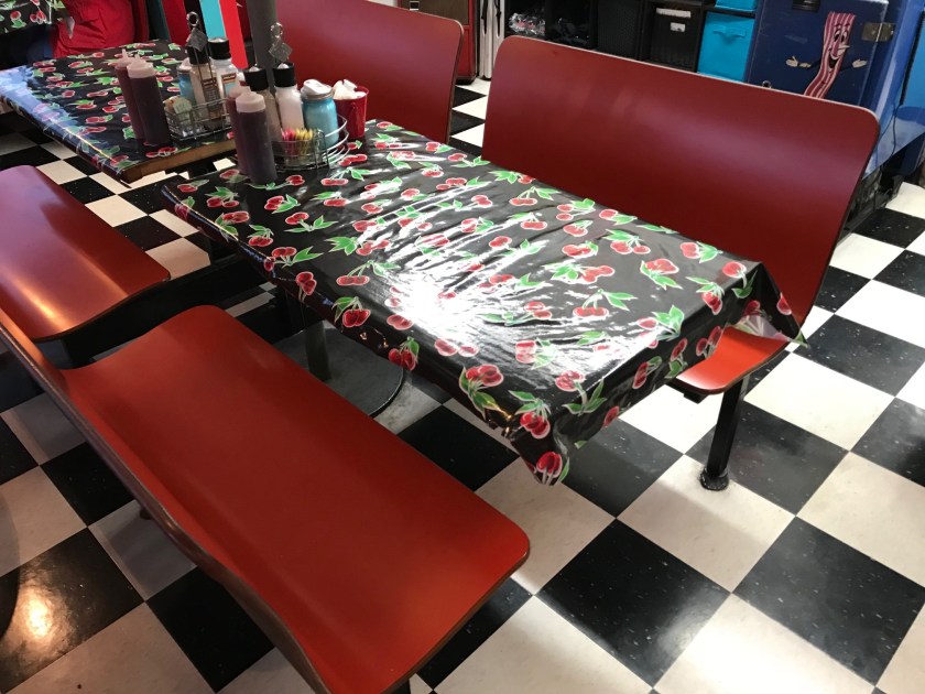 The tables at Addi’s have curved wooden bench seats and are super comfortable