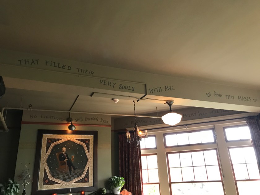 Mystical themes painted on the ceiling at the Billy Scott bar