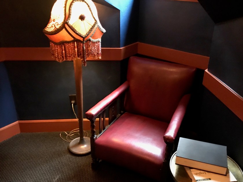 The reading nooks feature stuffed chairs, fancy tasseled floor lamps and a window to the outside.  They also frequently have reading suggestions just nearby