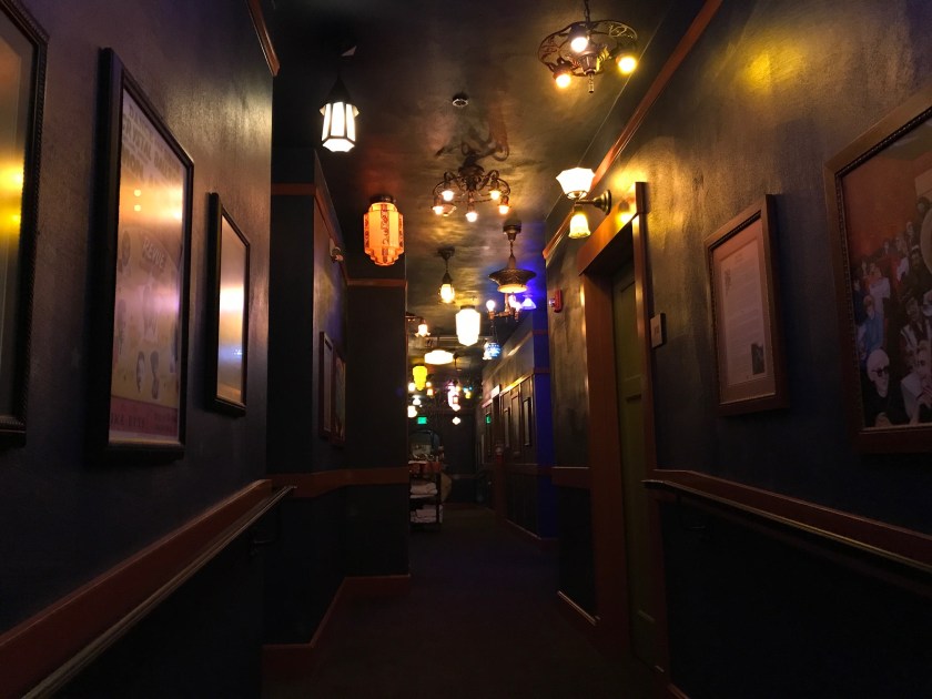 The hallway extends out a long distance concealing the recessed nooks and hidden features