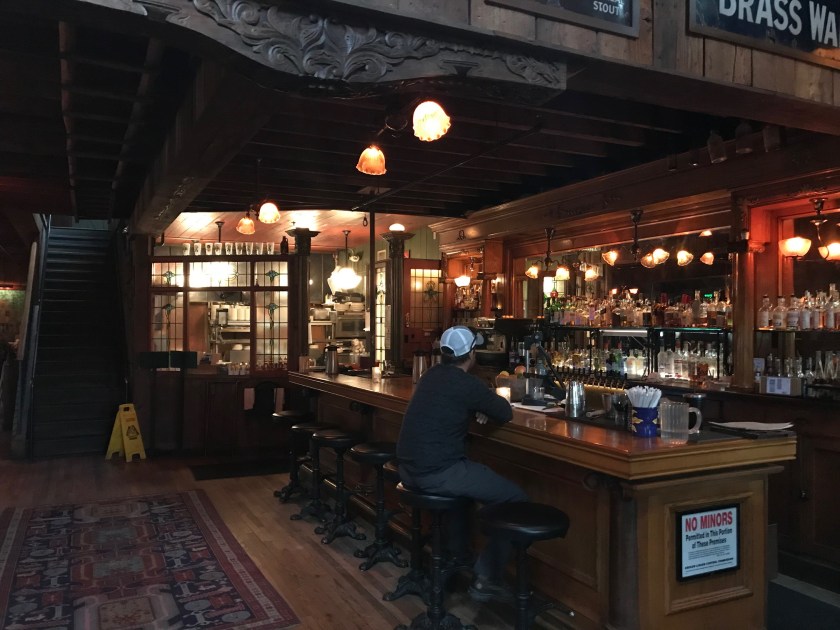 The bar area and the cooking area located just below the second floor dining area