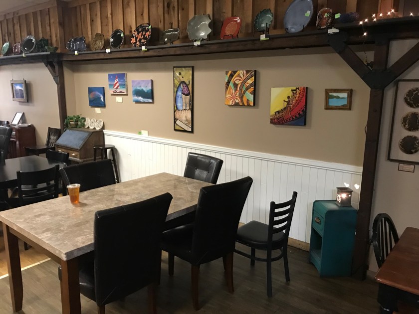 My table was very comfortable with padded leather chairs.  All of the artwork on the walls is for sale, which is a very nice touch