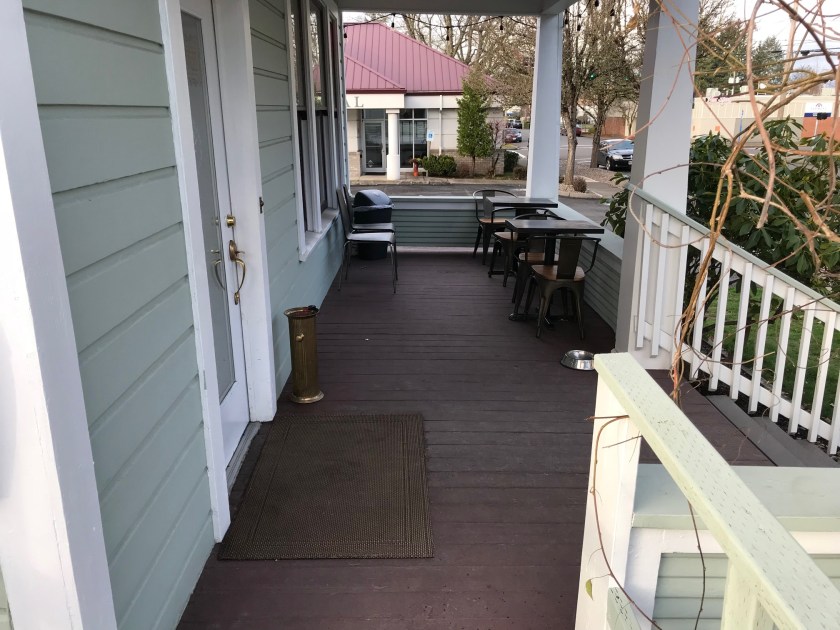 Telvet Coffee front porch, nice couple of chairs and tables can be seen