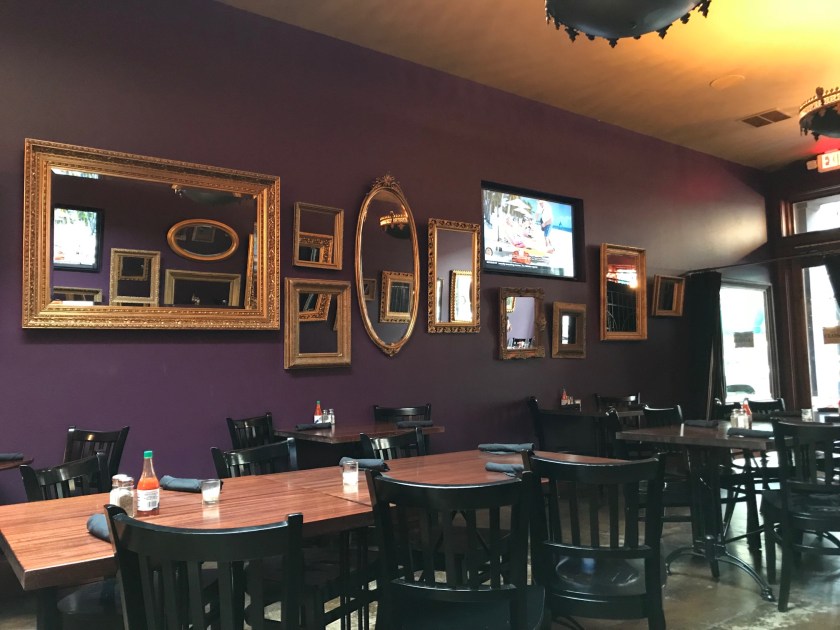 The mirrors in Gem are gorgeous and striking against the dark purple of the walls