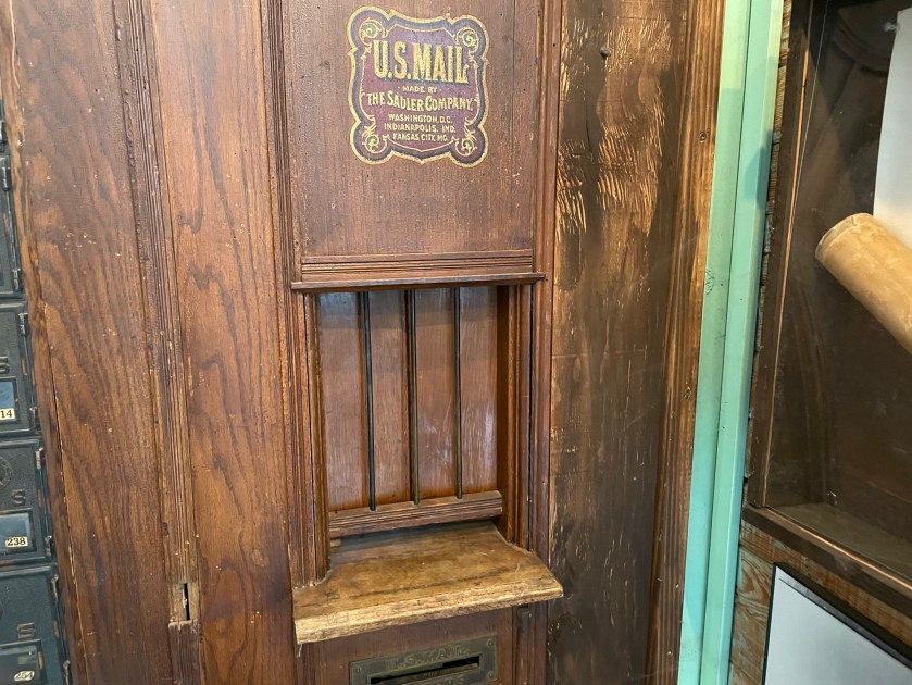 Tiny US Mail employee window.